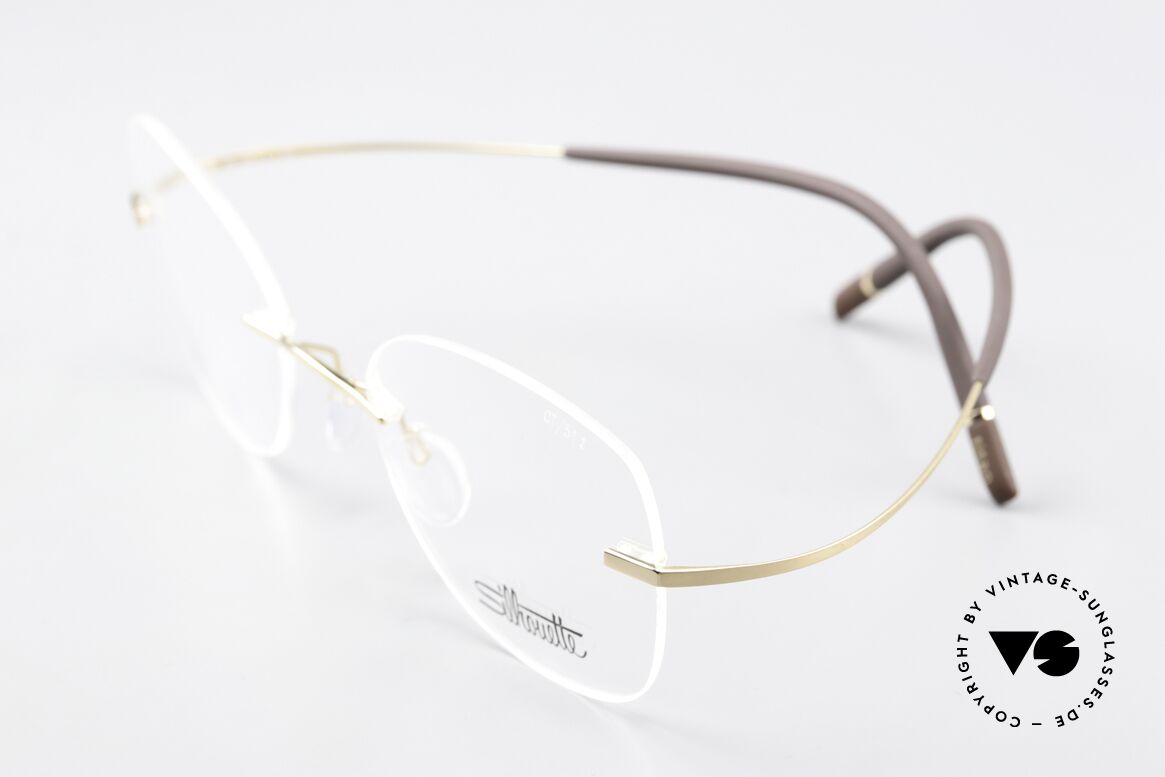 Silhouette 5541 Randlose Titaniumbrille, hier mit sehr weiblichen Demogläsern & vergoldet, Passend für Damen