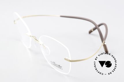 Silhouette 5541 Randlose Titaniumbrille, hier mit sehr weiblichen Demogläsern & vergoldet, Passend für Damen